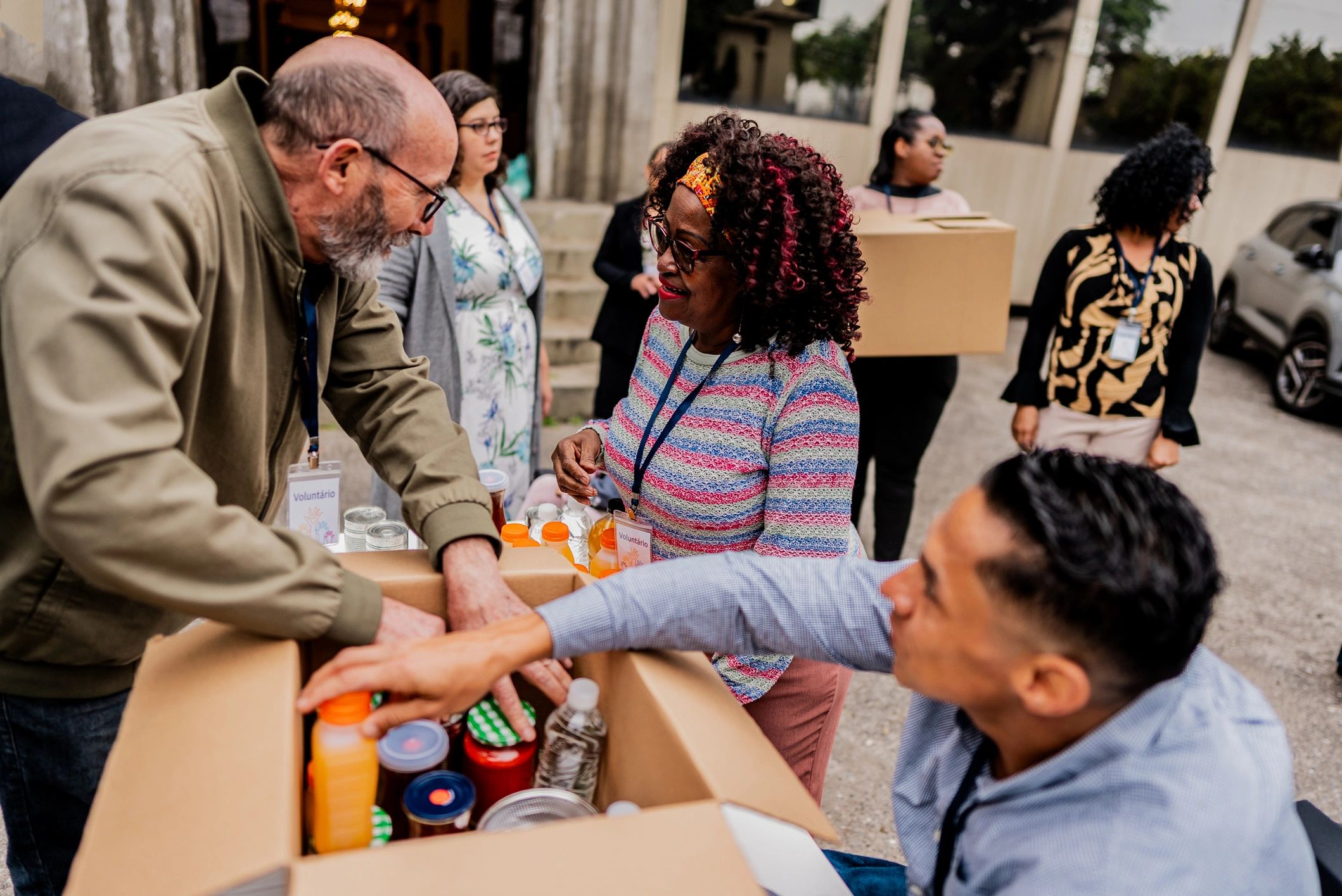 Volunteers working together in community service